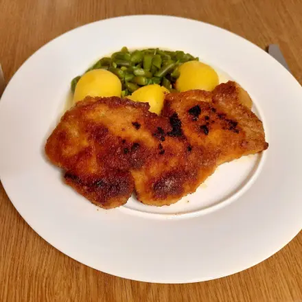 Kotelett mit Bohnengemüse und Kartoffeln