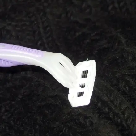 Fussel von Kleidung entfernen