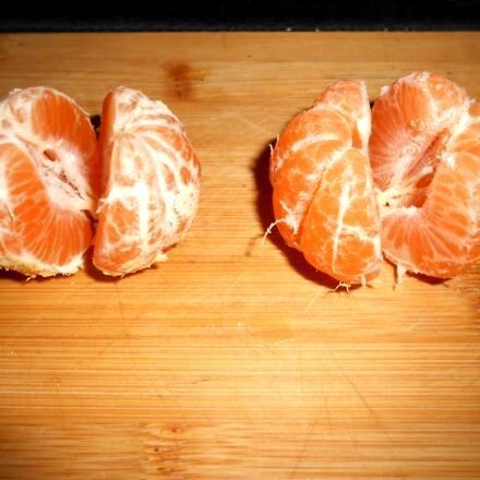 Haut entfernen von Mandarinen & Co.