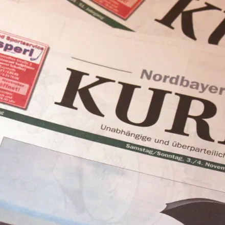 Bügeln mit Zeitungspapier