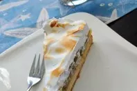 Stachelbeerkuchen mit flambierter Schaumdecke